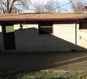 Before: crappy wire dangles right next to back door.